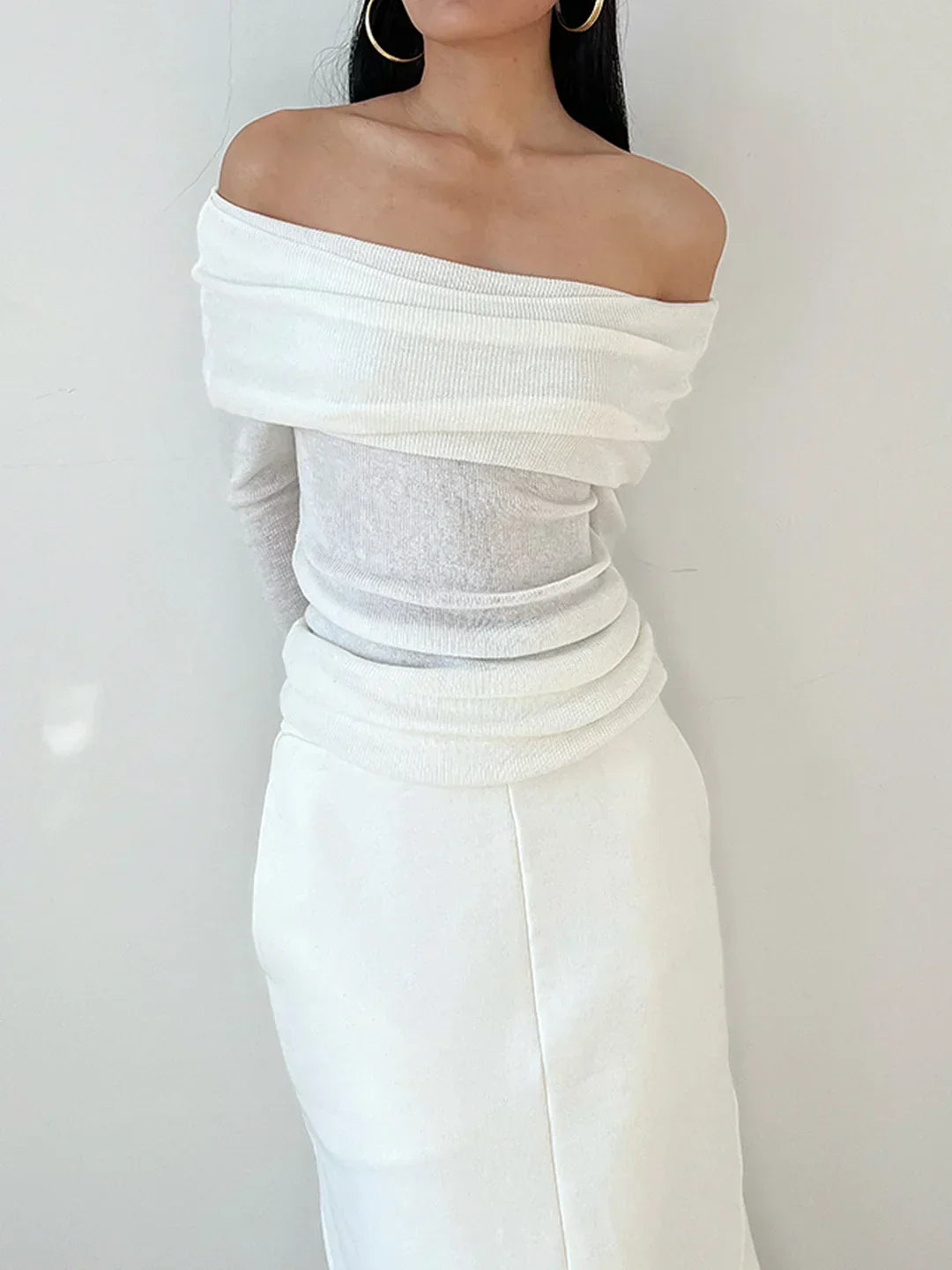 Vellaro top de manga larga y hombros descubiertos