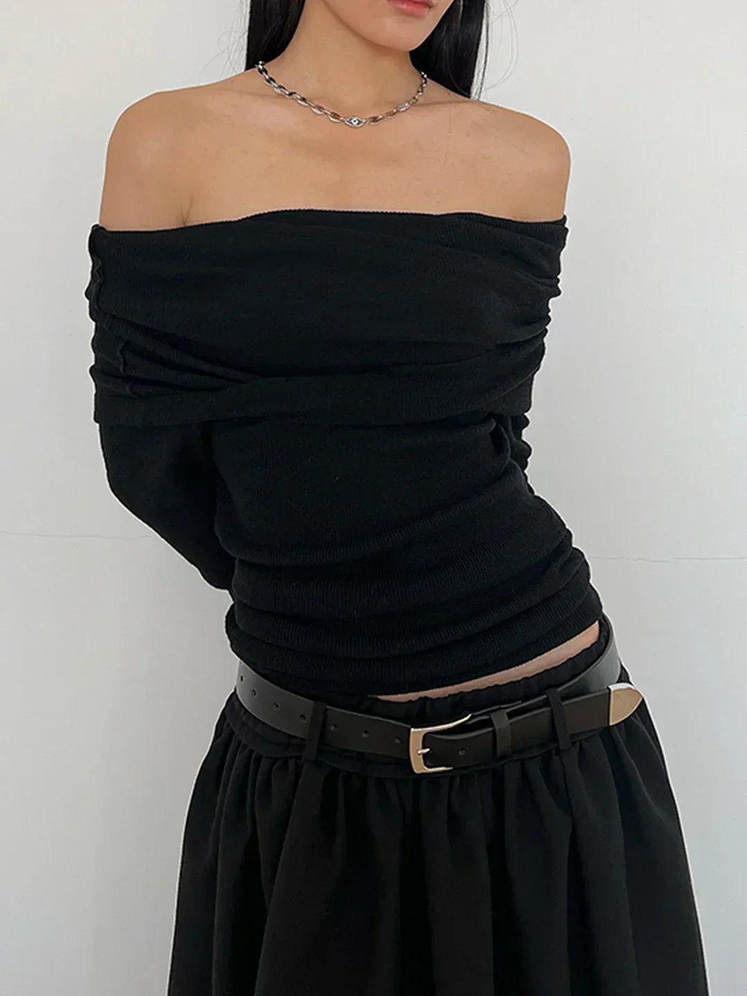 Vellaro top de manga larga y hombros descubiertos