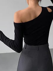 Vellaro top de manga larga con aberturas